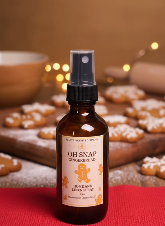 Bottle of 'OH SNAP' with Christmas-themed cookies and decorations on a red surface.