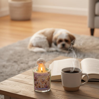 Candle with a dog figurine on a coffee table with a book and a cup of coffee in a cozy living room