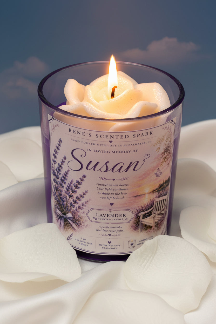  Forever in Our Hearts personalized candle glowing warmly showing Susan memorial label with watercolor lavender design