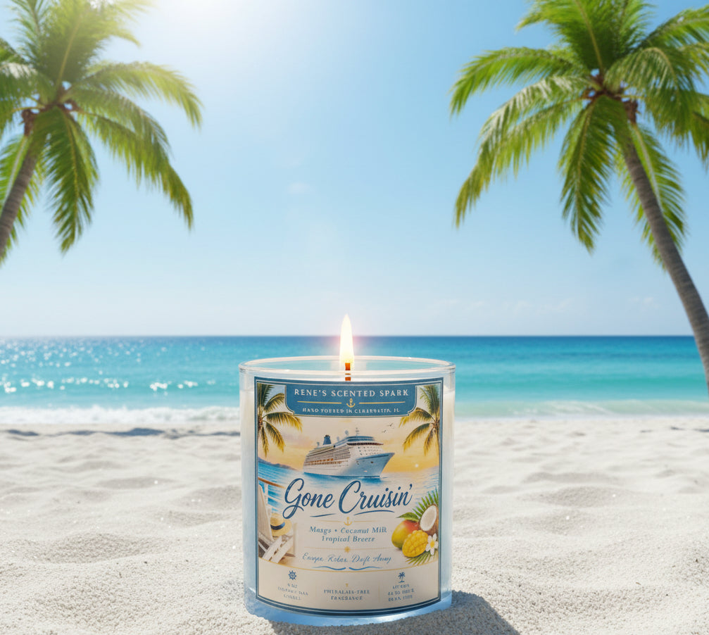 Lit Gone Cruisin' hand-poured coconut wax candle displayed on a white sandy beach with turquoise ocean and palm trees. Tropical Mango Coconut Milk scented candle inspired by relaxing cruise vacations.