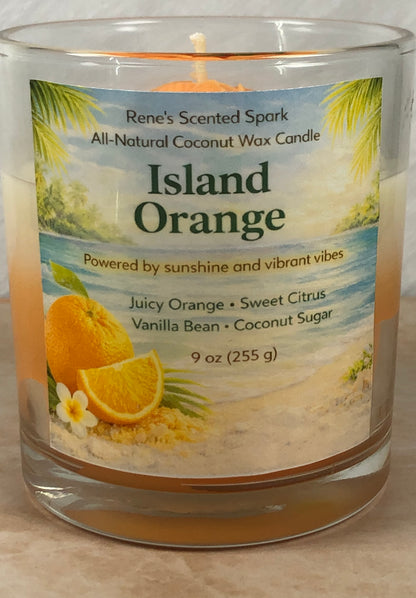 Candle labeled 'Island Orange' with a beach scene on the label