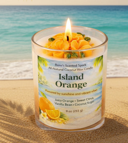 Candle labeled 'Island Orange' on a beach with ocean in the background