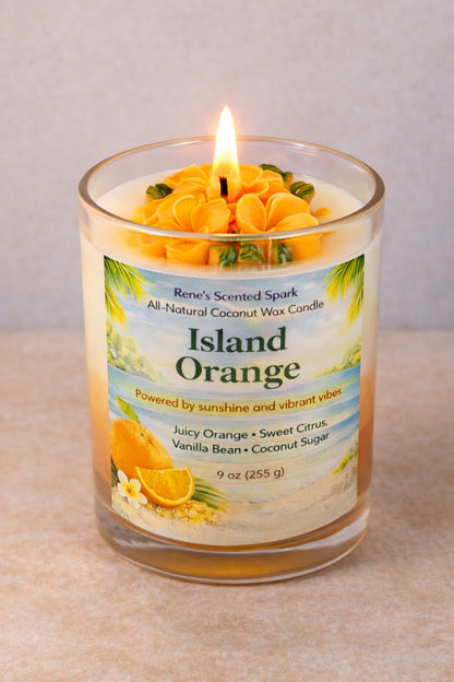 Lit Island Orange coconut wax candle in a glass jar with a tropical beach label and orange citrus scent.