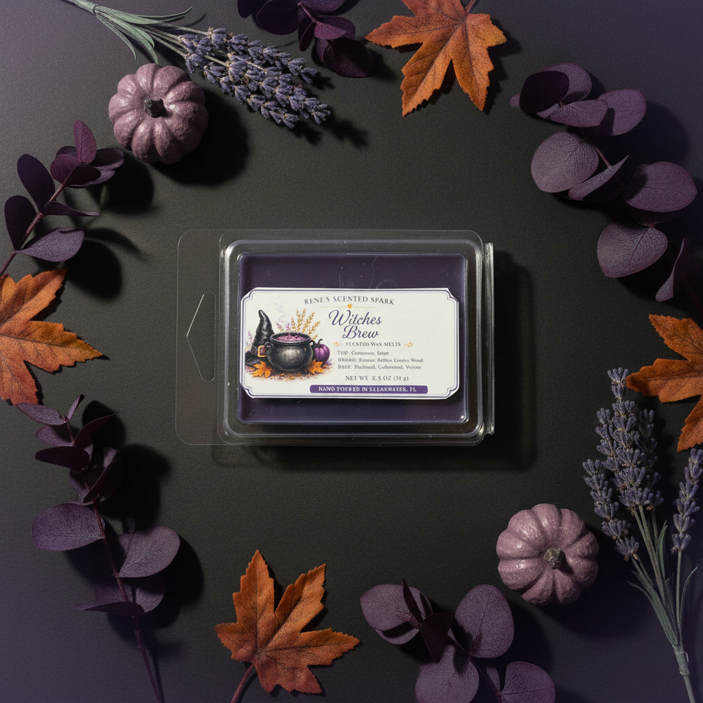 Witches Brew purple wax melts by Rene’s Scented Spark surrounded by lavender, dark purple foliage, autumn leaves, and decorative pumpkins on a dark background.