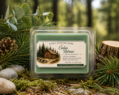 Cabin Retreat 2.5 oz green wax melts surrounded by pine, eucalyptus, moss and pinecones in a peaceful woodland setting.