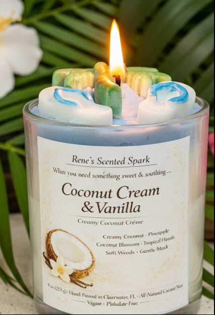 Coconut Cream & Vanilla' with a flame, surrounded by greenery and flowers.