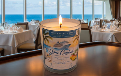 Lit Gone Cruisin' hand-poured coconut wax candle displayed on a cruise ship dining table overlooking the ocean. Tropical Mango Coconut Milk scented candle inspired by relaxing Caribbean vacations.