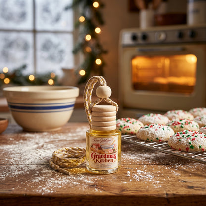 Grandma's Kitchen Christmas car freshener on a vintage kitchen counter with sugar cookies, a mixing bowl and a glowing oven