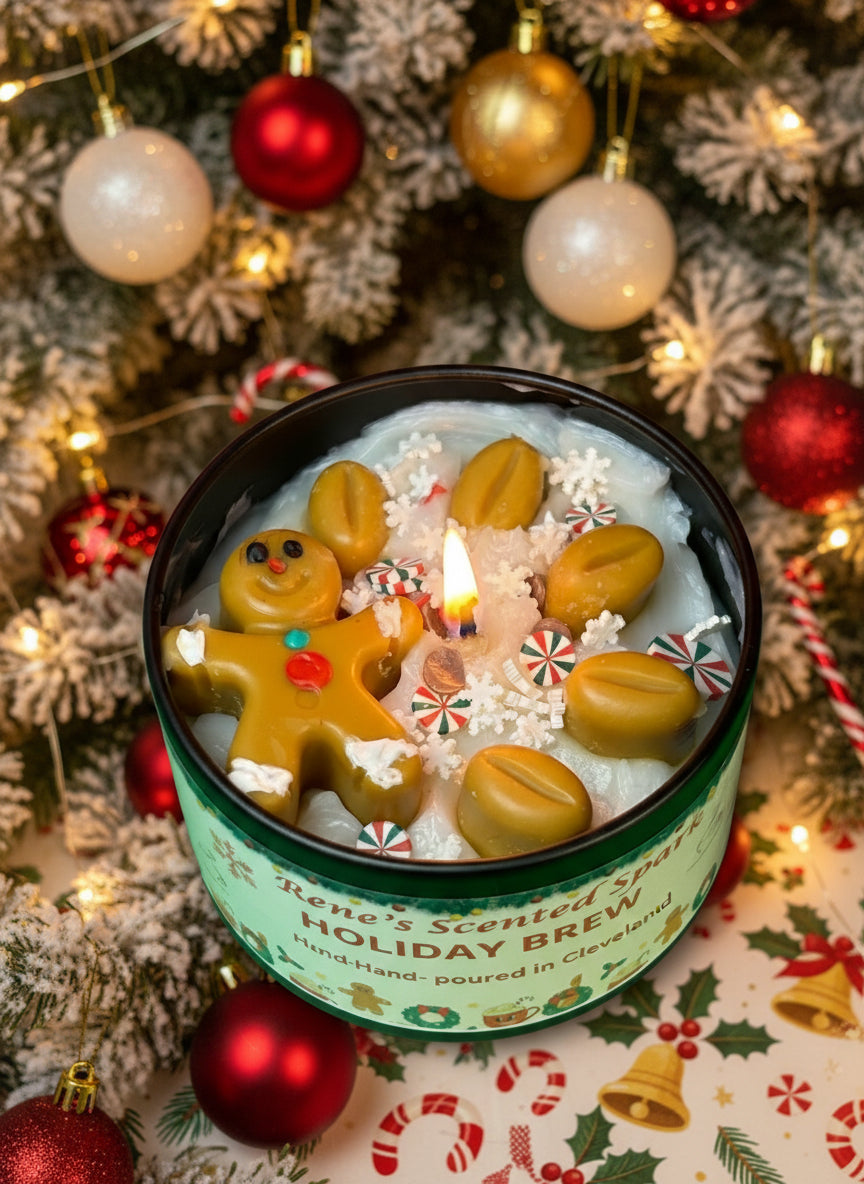 4 oz Holiday Brew candle in a black tin with a gingerbread man and peppermint wax toppings, hand-poured by Rene’s Scented Spark in Clearwater, FL.