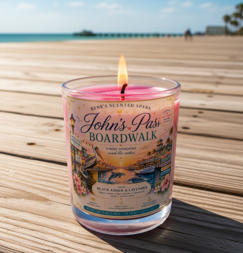 Candle with a label on a wooden deck and blue sky and ocean  background
