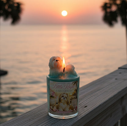 Candle with dog figurines on a dock during sunset