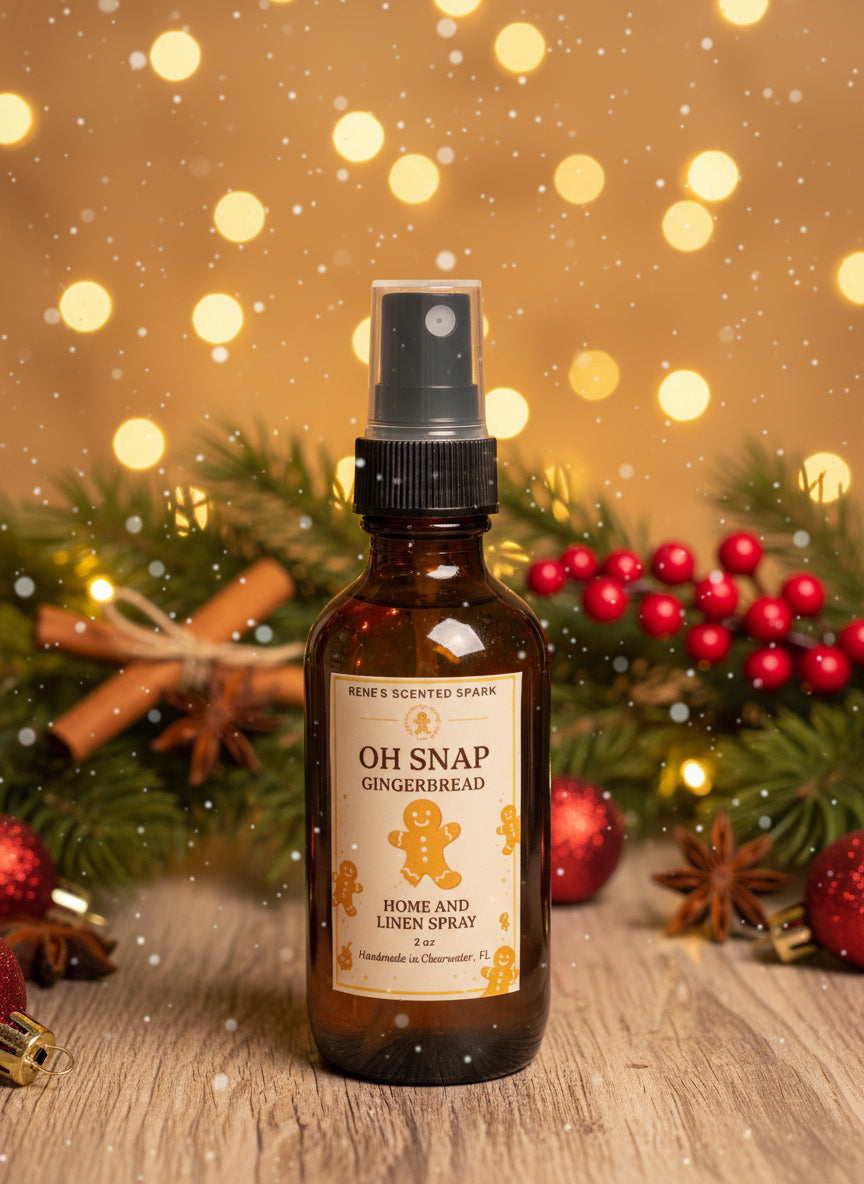 Bottle of 'Oh Snap Gingerbread' home and linen spray with Christmas decorations in the background.