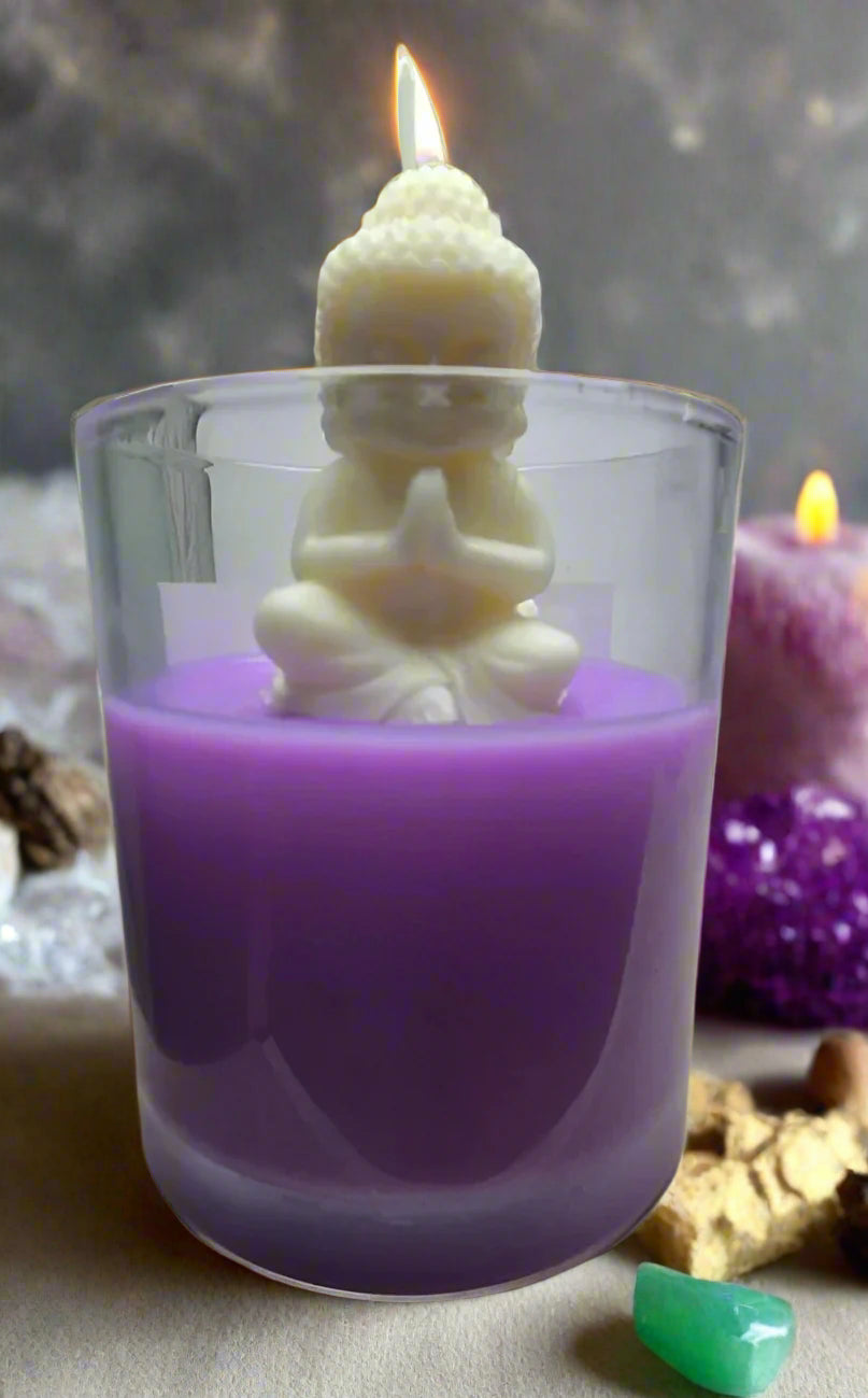 Tranquil Spirit candle glowing beside a yoga mat, crystals, and incense, creating a serene meditation space