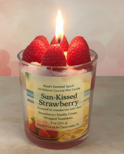 Candle in a glass jar with raspberries and a visible label on a light background
