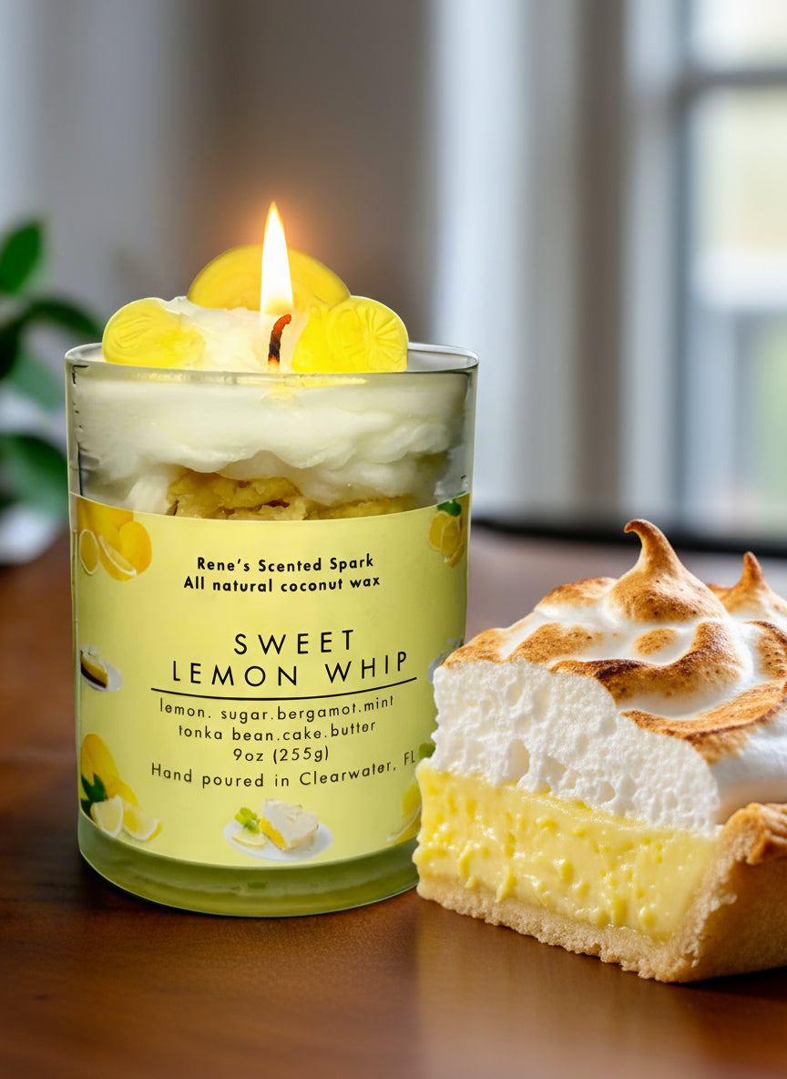 Candle labeled 'Sweet Lemon Whip' with lemon slices on top with a slice of  lemon pie