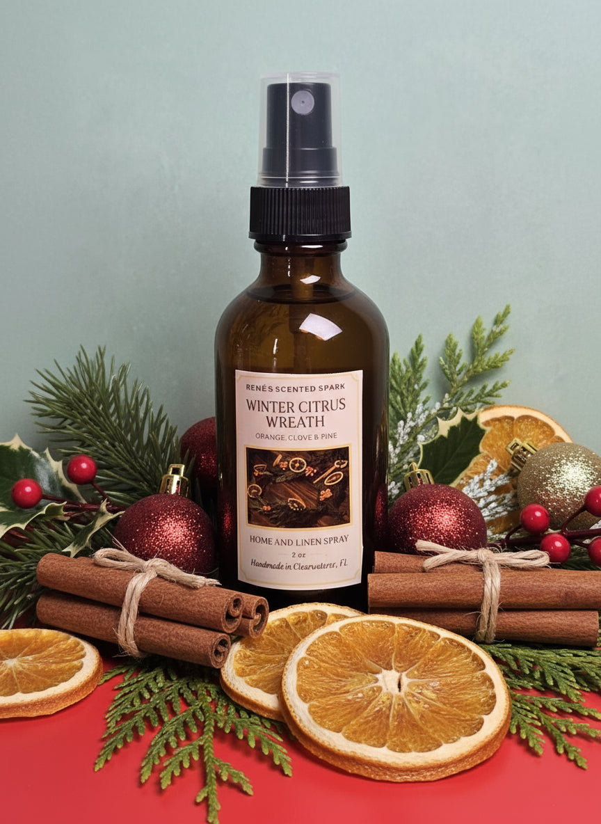 Bottle of winter citrus wreath spray with Christmas decorations in the background