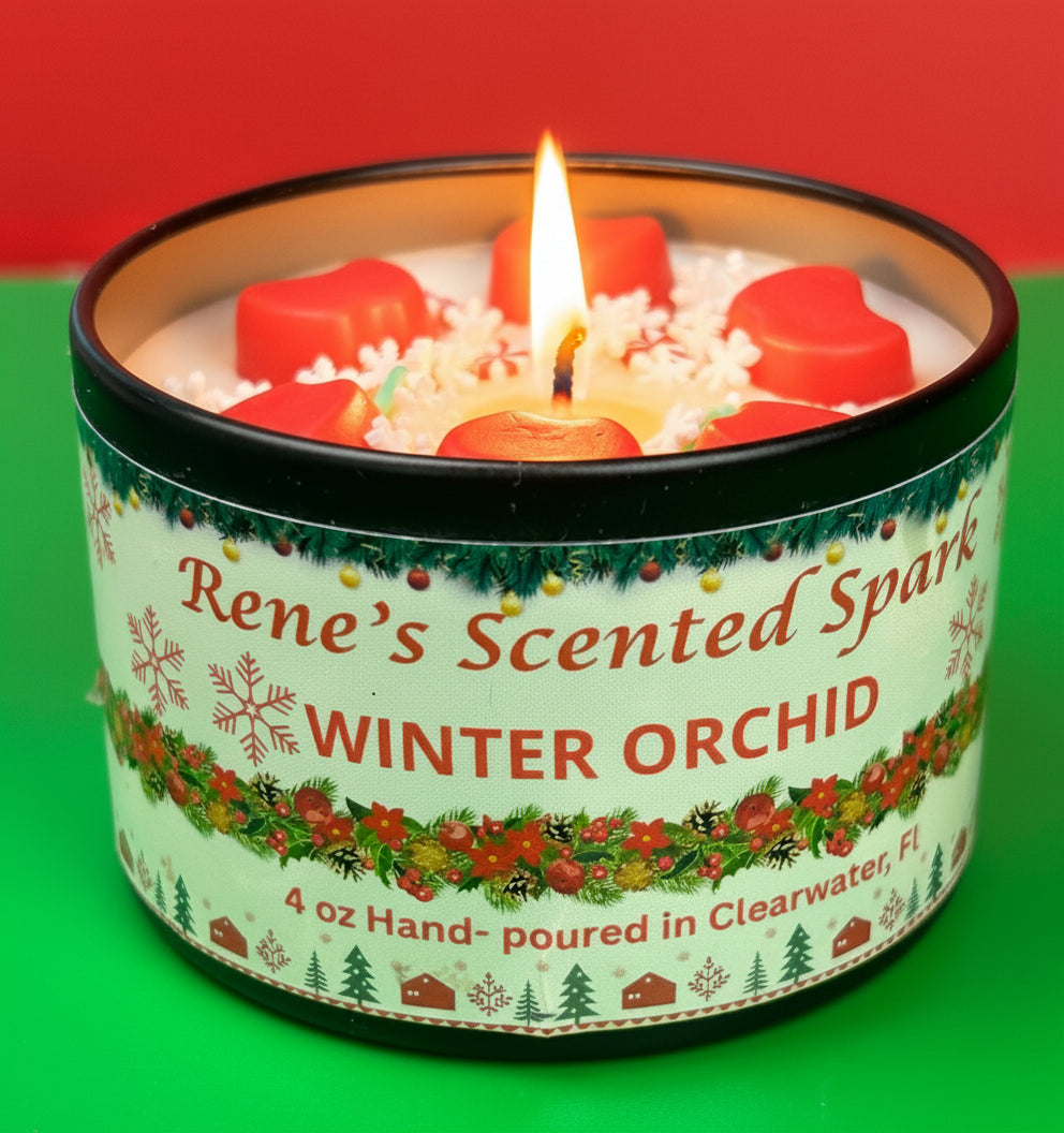 4 oz Winter Orchid candle tin with red wax stars and peppermint decorations, hand-poured by Rene’s Scented Spark in Clearwater, FL.