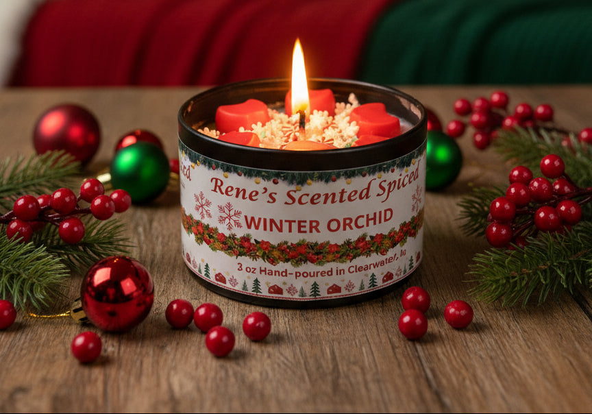 4 oz Winter Orchid candle tin with red wax stars and peppermint decorations, hand-poured by Rene’s Scented Spark in Clearwater, FL.