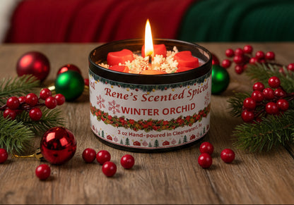 4 oz Winter Orchid candle tin with red wax stars and peppermint decorations, hand-poured by Rene’s Scented Spark in Clearwater, FL.