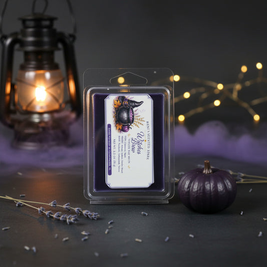 Witches Brew purple wax melts by Rene’s Scented Spark displayed with a glowing lantern, dark purple pumpkin, lavender sprigs, and soft purple mist.